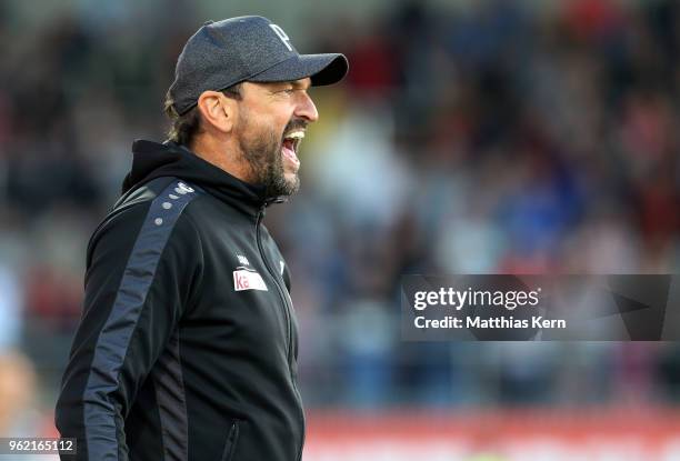 Head coach Claus Dieter Wollitz of Cottbus gestures during the Third League Playoff Leg 1 match between SC Weiche Flensburg 08 and FC Energie Cottbus...