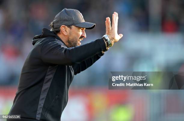 Head coach Claus Dieter Wollitz of Cottbus gestures during the Third League Playoff Leg 1 match between SC Weiche Flensburg 08 and FC Energie Cottbus...