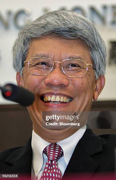 Hong Kong Monetary Authority Chief Executive Joseph Yam laughs during a press conference in Hong Kong, China Wednesday, May 18, 2005. The Hong Kong...