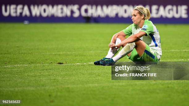 Wolfsburg's German midfielder Anna Blasse reacts after being defeated at the end of the UEFA Women's Champions League final football match Vfl...