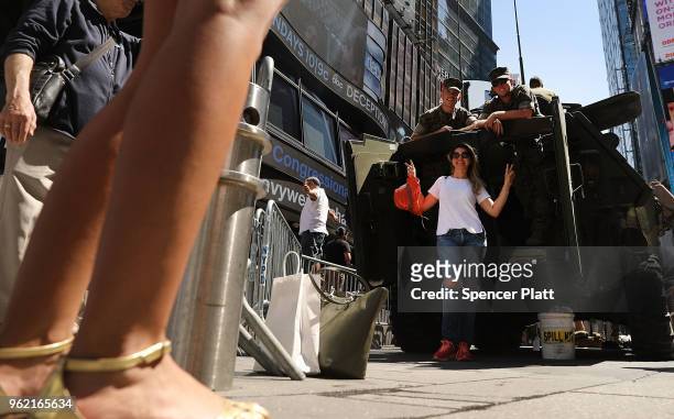 Woman tours a United States Marine military vehicle in Times Square as part of Fleet Week festivities May 24, 2018 in New York City. Fleet Week,...