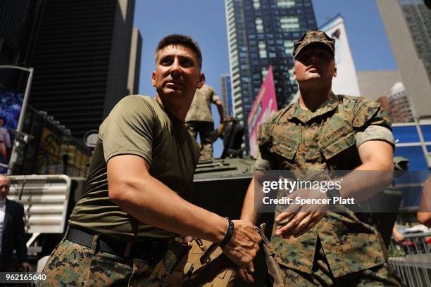 United States Marines give tours in Times Square as part of Fleet Week festivities on May 24, 2018 in New York City. Fleet Week, which has been held...