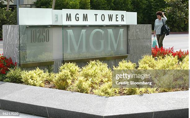 Woman walks past the front of the MGM Tower building in Century City, California on September 14, 2004. Sony and three other investors bid $12 a...