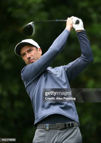 Ross Fisher of England tees off on the 13th during day one of the 2018 BMW PGA Championship at Wentworth on May 24, 2018 in Virginia Water, England.