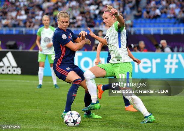 Alexandra Popp of Vfl Wolfsburg and Ada Hegerberg of Lyon compete for the ball during the UEFA Womens Champions League Final between VfL Wolfsburg...