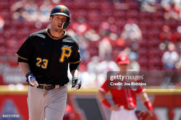 David Freese of the Pittsburgh Pirates rounds the bases after hitting a two-run home run in the sixth inning against the Cincinnati Reds at Great...