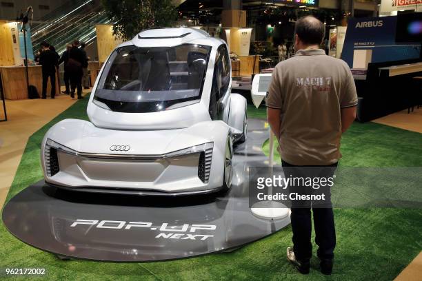 An Airbus and Audi's Pop.Up Next concept car is displayed during the Viva Technologie show at Parc des Expositions Porte de Versailles on May 24,...