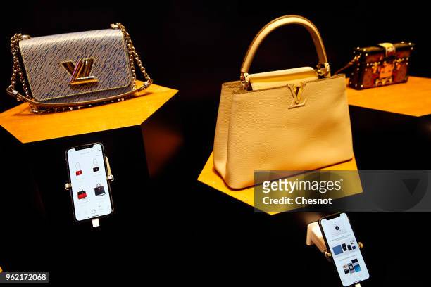 The Louis Vuitton app is displayed on the screen of an iPhone during the Viva Technologie show at Parc des Expositions Porte de Versailles on May 24,...
