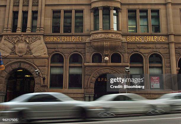 Traffic passes by Burns Philp & Co.'s offices in Sydney, Australia Monday, November 14, 2005. Bain Capital, the investment firm founded by...