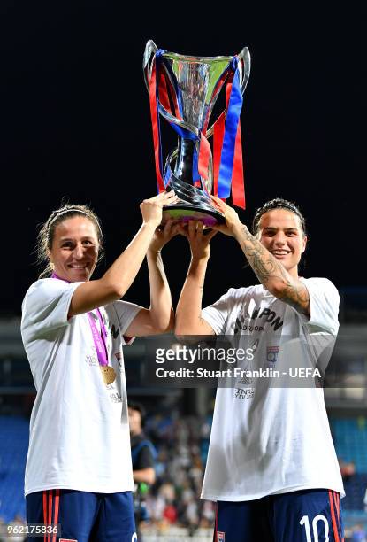 Dzsenifer Marozsan and Camille Abily of Lyon celebrate with the trophy after the UEFA Womens Champions League Final between VfL Wolfsburg and...
