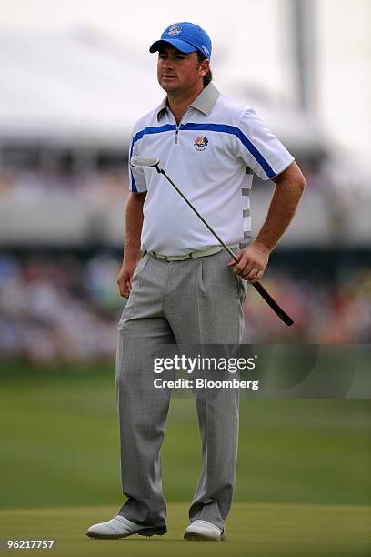 Graeme McDowell of the European team reacts after missing an eagle putt on the 7th hole during an afternoon four-ball match on day one of the 37th...