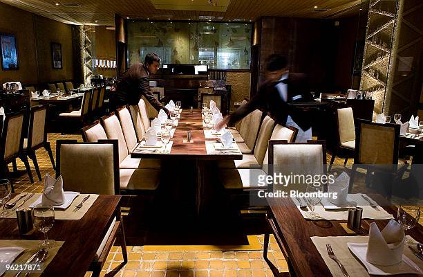 Tables are set at Sattvik restaurant at Select CityWalk Mall in New Delhi, India, on Saturday, Sept. 6, 2008. New Delhi today has more options for...