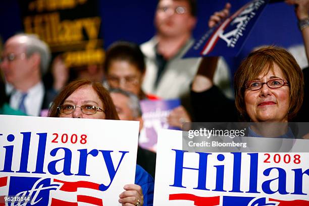 Two women show their support for Hillary Clinton, U.S. Senator from New York and 2008 Democratic presidential candidate, during a campaign rally at...