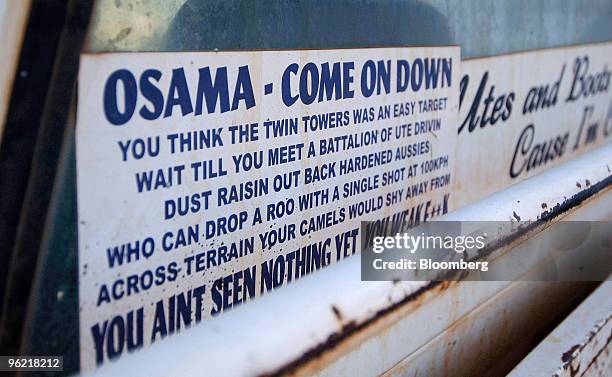 Pick-up truck at the Bachelor and Spinsters ball features an anti-Osama bin Laden sticker, in Trundle, Australia, on Saturday, March 1, 2008. With 48...