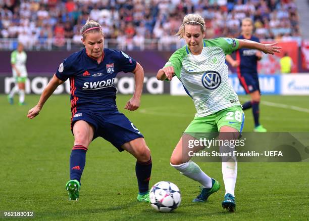 Lena Goeßling of Vfl Wolfsburg and Eugenie Le Sommer of Lyon compete for the ball during the UEFA Womens Champions League Final between VfL Wolfsburg...