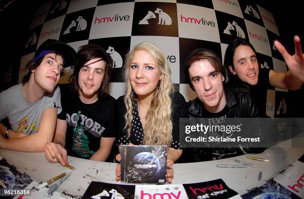 James Smith, Nick Rice, Alice Spooner, Christopher Purcell and Daniel "Pilau" Rice of Hadouken! pose after signing for fans in store at HMV's newly...