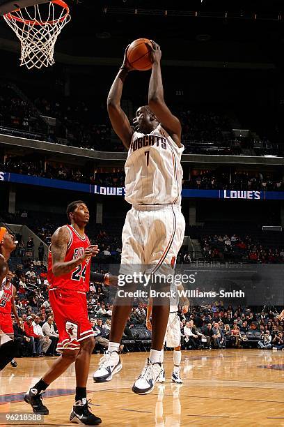 DeSagana Diop of the Charlotte Bobcats rebounds the ball against Tyrus Thomas of the Chicago Bulls during the game on January 5, 2010 at Time Warner...