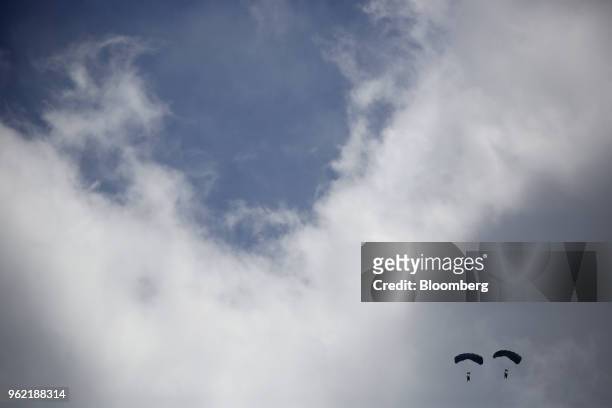 Special operators conduct a free-fall parachute jump into the bay during an International Special Operations Forces capacities exercise outside the...
