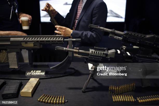 Guns and ammunition are displayed during the Special Operations Forces Industry Conference in Tampa, Florida, U.S., on Tuesday, May 22, 2018. The...