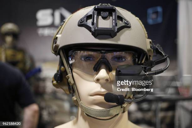 Military combat helmet is displayed on a mannequin during the Special Operations Forces Industry Conference in Tampa, Florida, U.S., on Tuesday, May...