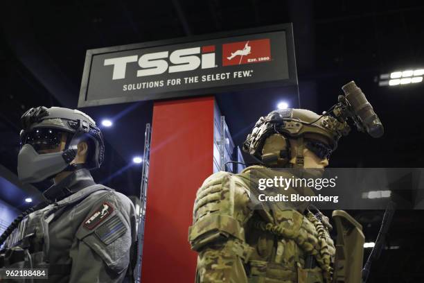 Mannequins displaying tactical gear are seen at the Tactical & Survival Specialties Inc. Booth during the Special Operations Forces Industry...