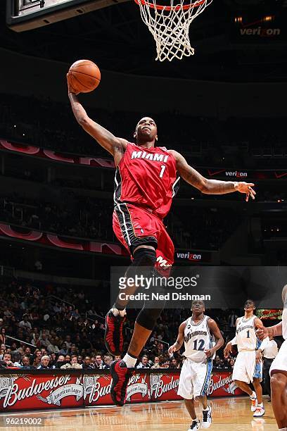 Dorell Wright of the Miami Heat goes for the dunk against the Washington Wizards during the game on January 22, 2010 at the Verizon Center in...