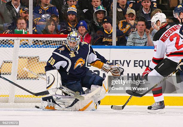 Ryan Miller of the Buffalo Sabres blocks a rebound shot taken by Rob Niedermayer of the New Jersey Devils on January 27, 2010 at HSBC Arena in...