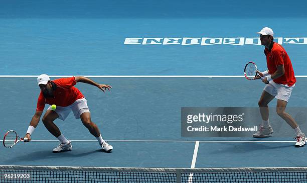 Nenad Zimonjic of Serbia plays a forehand in his semifinal doubles match with Daniel Nestor of Canada against Ivo Karlovic of Croatia and Dusan Vemic...