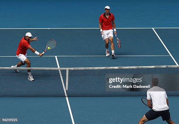 Nenad Zimonjic of Serbia plays a backhand in his semifinal doubles match with Daniel Nestor of Canada against Ivo Karlovic of Croatia and Dusan Vemic...