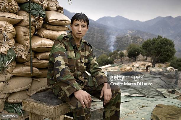 Afghan Army soldier Pinda Mohammad, 18-years-old, attached to US Army B Company, 2nd Battalion,12th Infantry Regiment, 4th Brigade,4th Infantry...