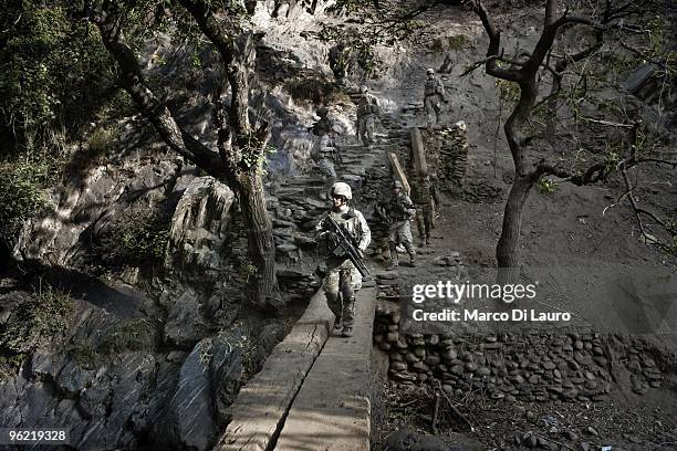 Army soldiers of B Company, 2nd Battalion,12th Infantry Regiment, 4th Brigade,4th Infantry Division Baker Company are seen during an operation to...