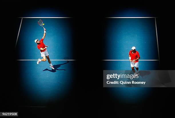 Daniel Nestor of Canada plays a forehand in his semifinal doubles match with Nenad Zimonjic of Serbia against Ivo Karlovic of Croatia and Dusan Vemic...