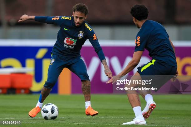 Neymar and Marquinhos in action during a training session of the Brazilian national football team at the squad's Granja Comary training complex on...