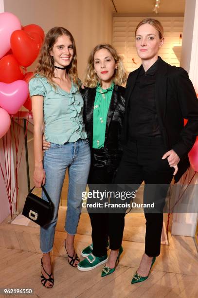 Dolores Dol, Alysson Paradis and Kate Moran attend Roger Vivier "#LoveVivier" Book Launch Cocktail on May 24, 2018 in Paris, France.