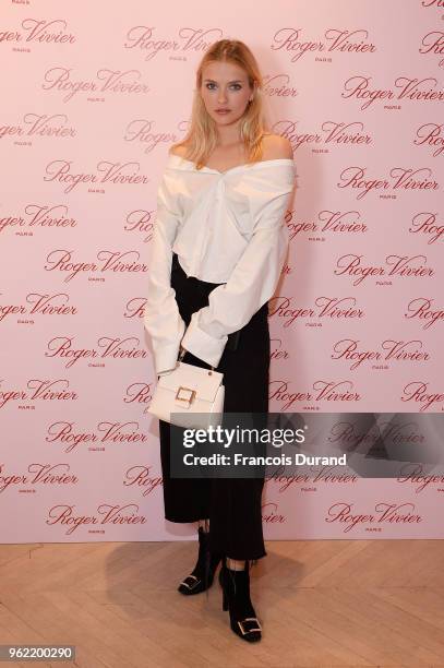 Camille Razat attends Roger Vivier "#LoveVivier" Book Launch Cocktail on May 24, 2018 in Paris, France.