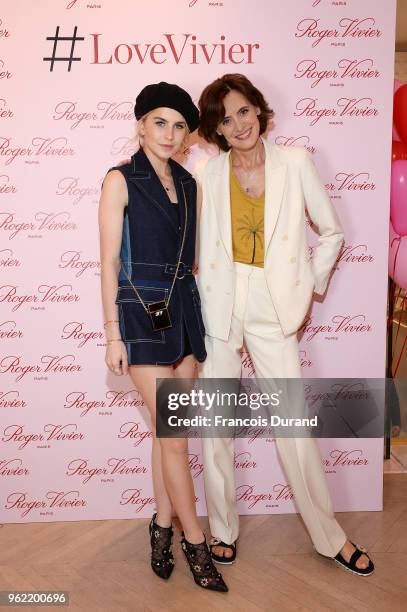 Caroline Daur and Ines de la Fressange attend Roger Vivier "#LoveVivier" Book Launch Cocktail on May 24, 2018 in Paris, France.