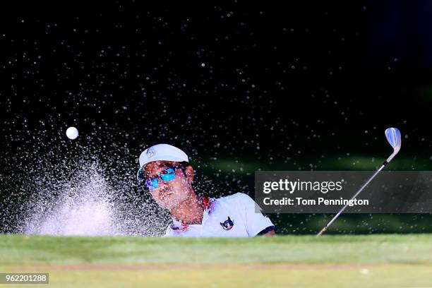 Kevin Na plays a shot from a bunker on the eighth hole during round one of the Fort Worth Invitational at Colonial Country Club on May 24, 2018 in...