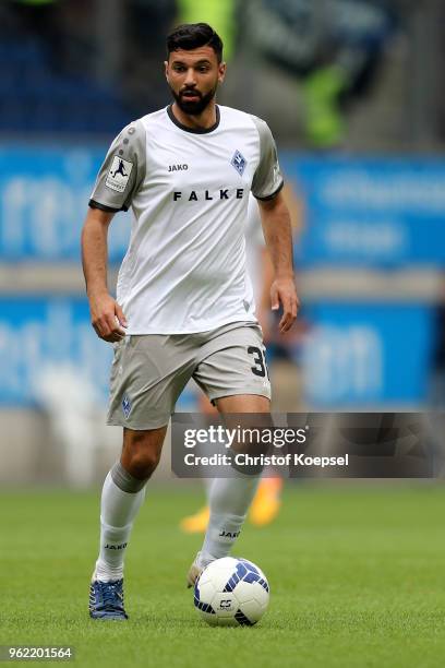 Daniel di Gregorio of Mannheim runs with the ball during the Third League Playoff first leg match between KFC Uerdingen and Waldhof Mannheim at...