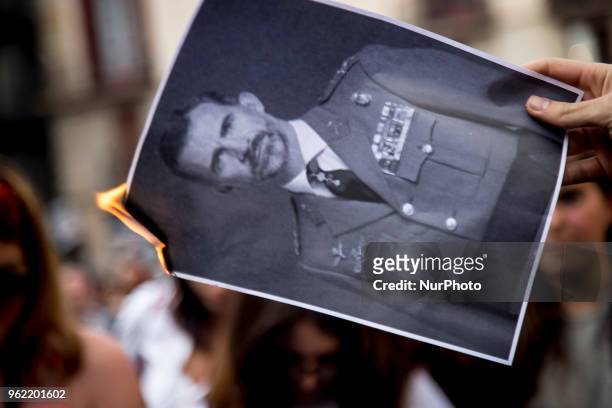 Activist burn photos of Spanish King Felipe VI. Organised by CDR , pro-independence activist demonstrate supporting exiled rap singer Valtònyc in...