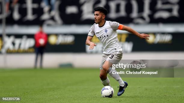 Hassan Amin of Mannheim runs with the ball during the Third League Playoff first leg match between KFC Uerdingen and Waldhof Mannheim at...