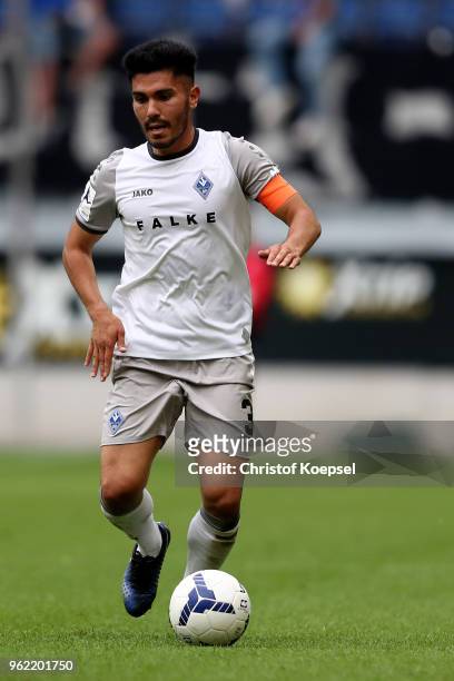 Hassan Amin of Mannheim runs with the ball during the Third League Playoff first leg match between KFC Uerdingen and Waldhof Mannheim at...