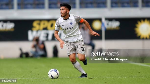 Hassan Amin of Mannheim runs with the ball during the Third League Playoff first leg match between KFC Uerdingen and Waldhof Mannheim at...