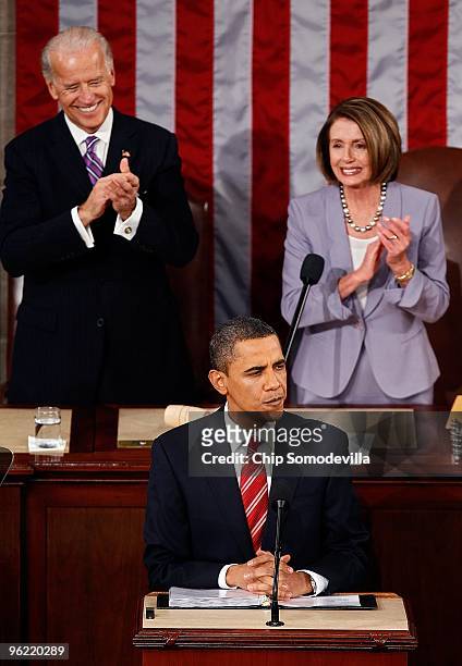 Vice President Joseph Biden and U.S. Speaker of the House Rep. Nancy Pelosi look on as U.S. President Barack Obama speaks to both houses of Congress...