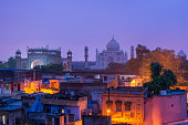 The Taj Mahal and Agra town at dawn
