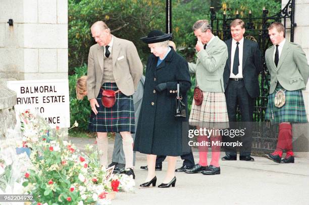 Royal Family, Balmoral Estate, Scotland, 5th September 1997. After attending a private service at Crathie Church, Royal family stop to look at floral...