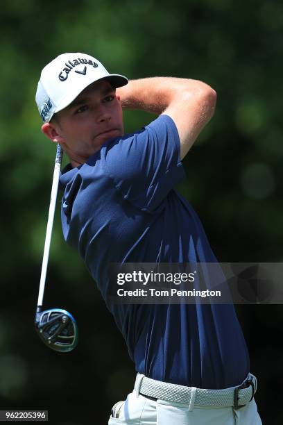 Aaron Wise plays his shot from the ninth tee during round one of the Fort Worth Invitational at Colonial Country Club on May 24, 2018 in Fort Worth,...