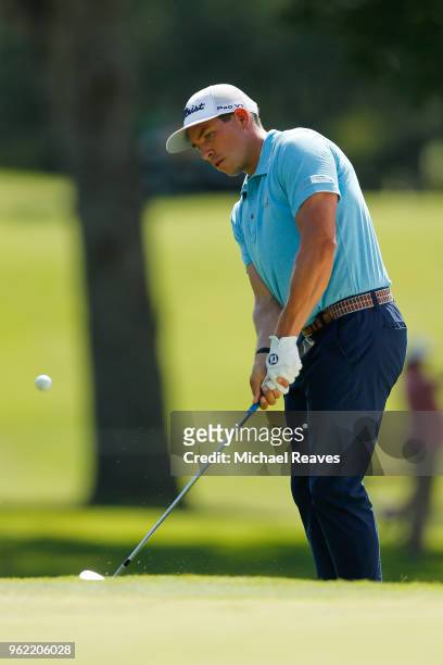 Scott Stallings chips on to the 11th green during round one of the Fort Worth Invitational at Colonial Country Club on May 24, 2018 in Fort Worth,...