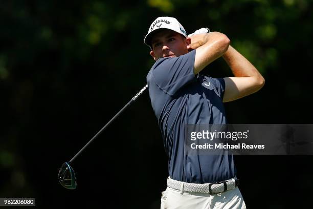 Aaron Wise plays his shot from the 12th tee during round one of the Fort Worth Invitational at Colonial Country Club on May 24, 2018 in Fort Worth,...