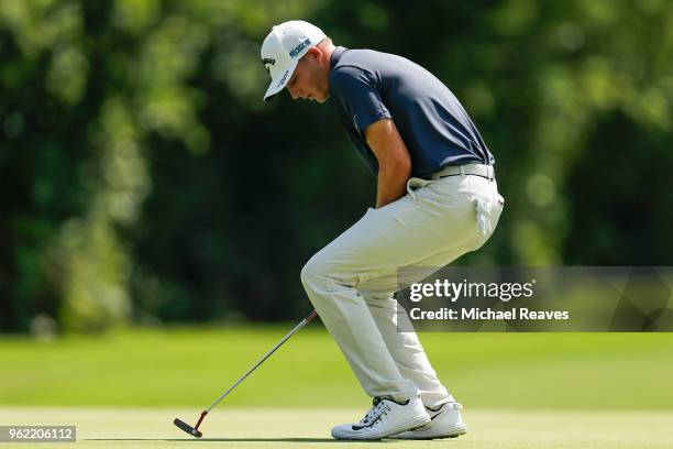 Aaron Wise reacts after missing a putt on the 11th green during round one of the Fort Worth Invitational at Colonial Country Club on May 24, 2018 in...