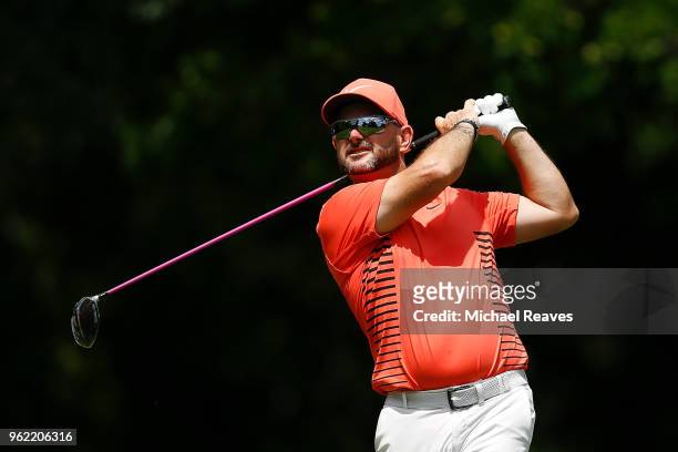 Rory Sabbatini of South Africa plays his shot from the 12th tee during round one of the Fort Worth Invitational at Colonial Country Club on May 24,...